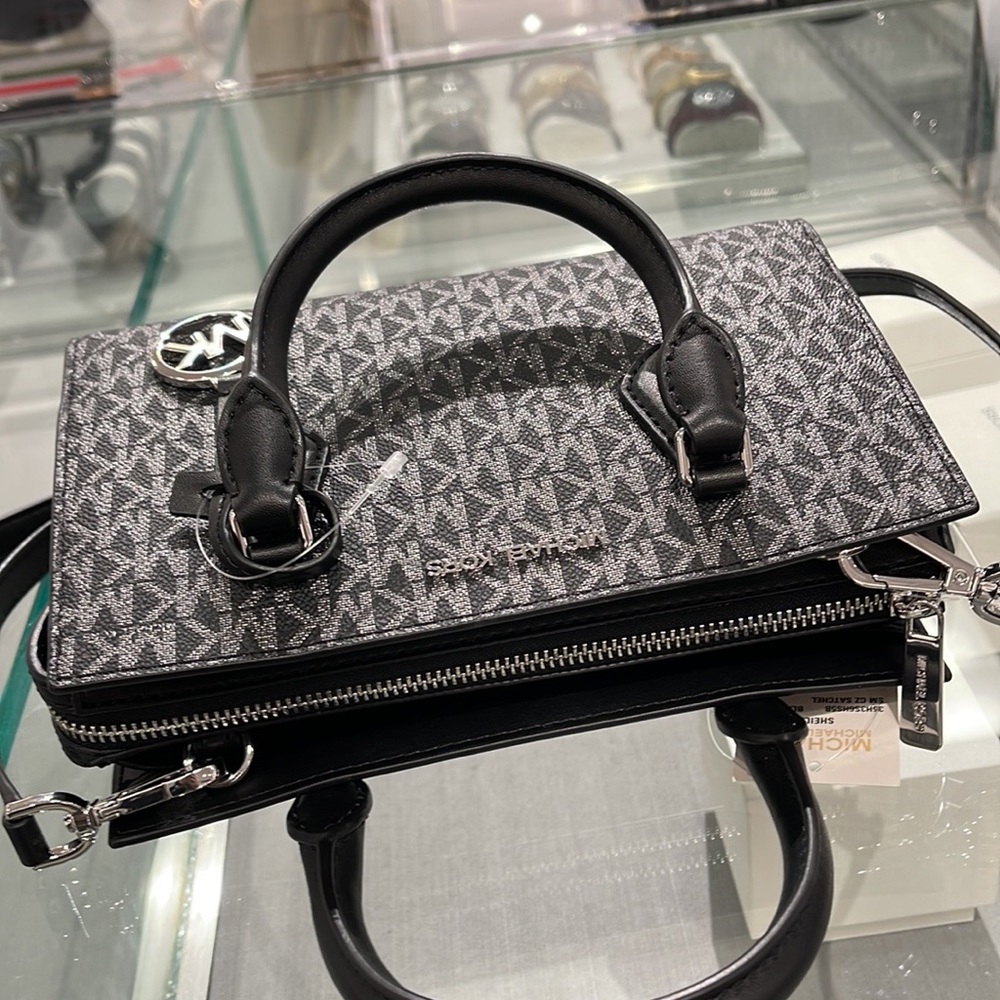 MICHAEL KORS
Sheila Small Faux Saffiano Leather Satchel
Black/Silver  
NWT - Picture 16 of 16